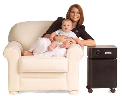 Austin Air purifier with woman and baby